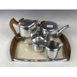 A vintage Picquot ware tea set with tray