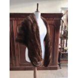 A mid 20th Century lady's mink stole, together with one other faux mink collar