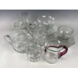A quantity of glassware including jugs, bowls a basket etc