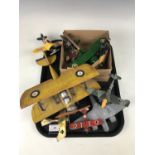 Reproduction tinplate model aircraft together with a trench art German plane etc