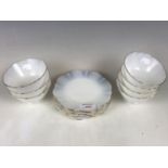 Seven pressed opaline glass dessert bowls and stands