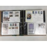 A ring binder containing a collection of QEII Isle of Man First Day Covers