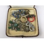 Vintage costume jewellery, including an early 20th Century white-metal Art Nouveau brooch set with