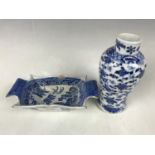 A late 19th century diminutive Chinese blue and white vase (a/f) together with a Willow pattern