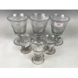 Three William IV cut glass rummers together with three custard cups