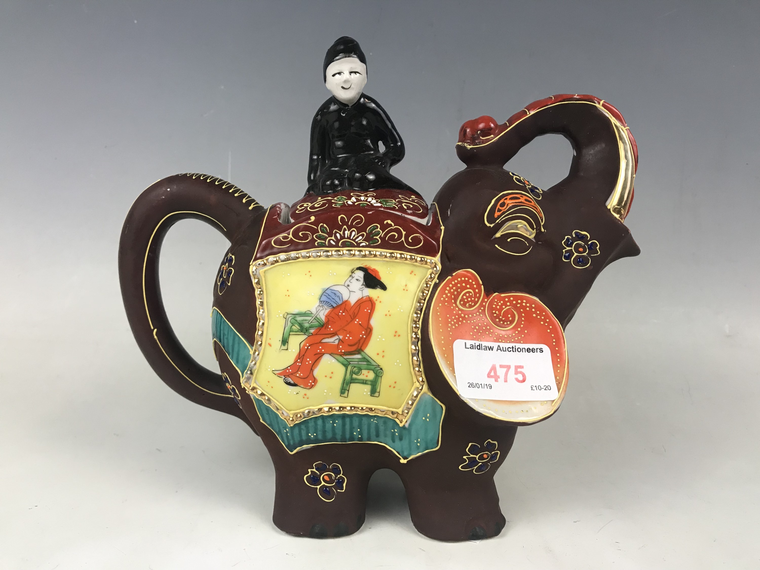 A vintage Japanese Satsuma novelty elephant-form teapot decorated with moriage enamels