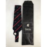 A gentleman's Gieves of London 'O.P.T.C' silk tie, decorated with the RAF device