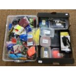 A large quantity of fishing fly tying materials including a fly tying vice, hooks, tools and capes