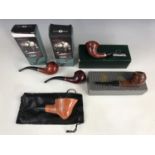 Boxed and 'as new' pipes, to include a Stanwell 'De Luxe' pipe, a Peterson of Dublin "Dumore"