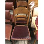 Two late 19th century Arts and Crafts influenced oak ladder back chairs