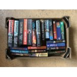 A carton of Clive Cussler books