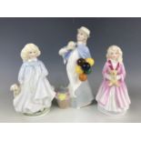 Three Royal Doulton figurines including Covent Garden HN2857, Faith HN3028 and Hope HN3061