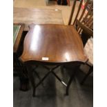 An Edwardian Sheritan revival string inlaid mahogany occasional table