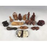 A quantity of reproduction netsuke etc