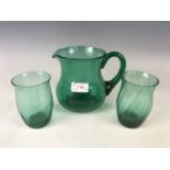 Three items of late 19th / early 20th century free-blown emerald glass wares