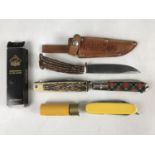 A boxed Puma clasp knife, together with further sporting clasp knives including a novelty Whitby &