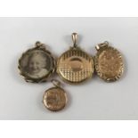 Four antique rolled-gold lockets, to include an open double locket containing period photographs