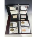 Three ring binders containing stamp covers, First Day covers, stamp exhibition covers, air mail