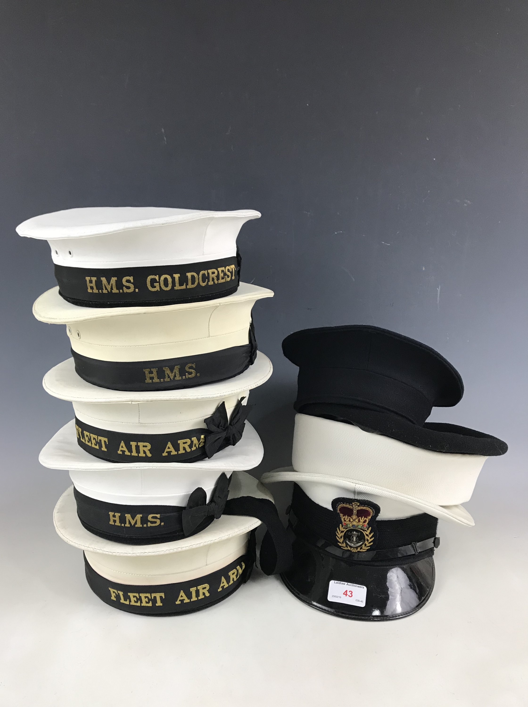 A quantity of post-War Royal Navy headgear