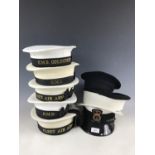 A quantity of post-War Royal Navy headgear