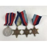 Four Second World War campaign medals including an Atlantic Star