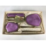 A vintage Rondis brush set