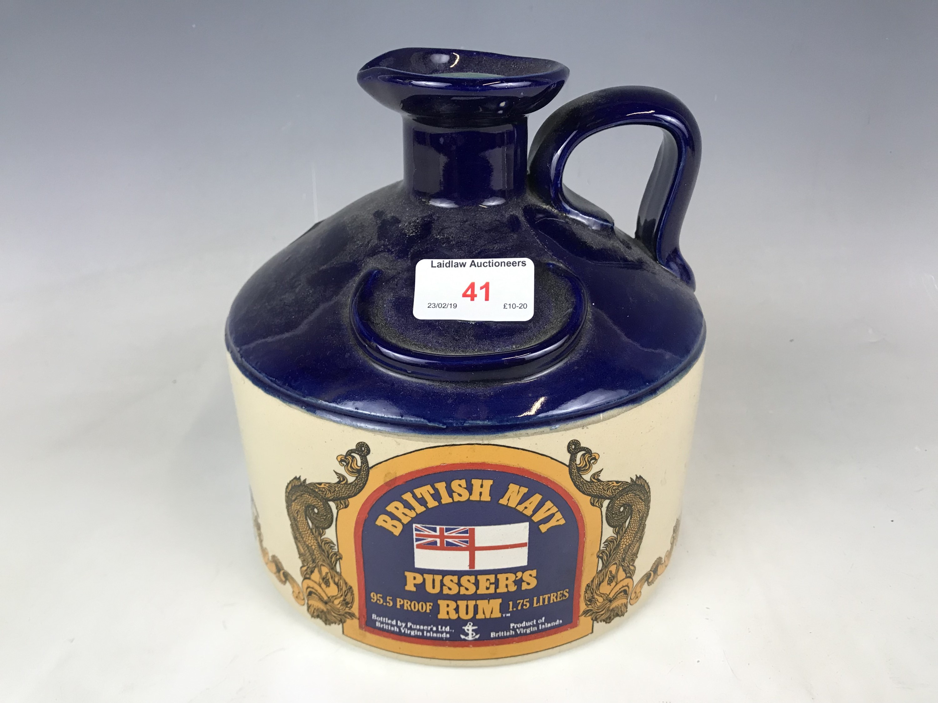 A large British Navy Pusser's Rum stoneware flagon