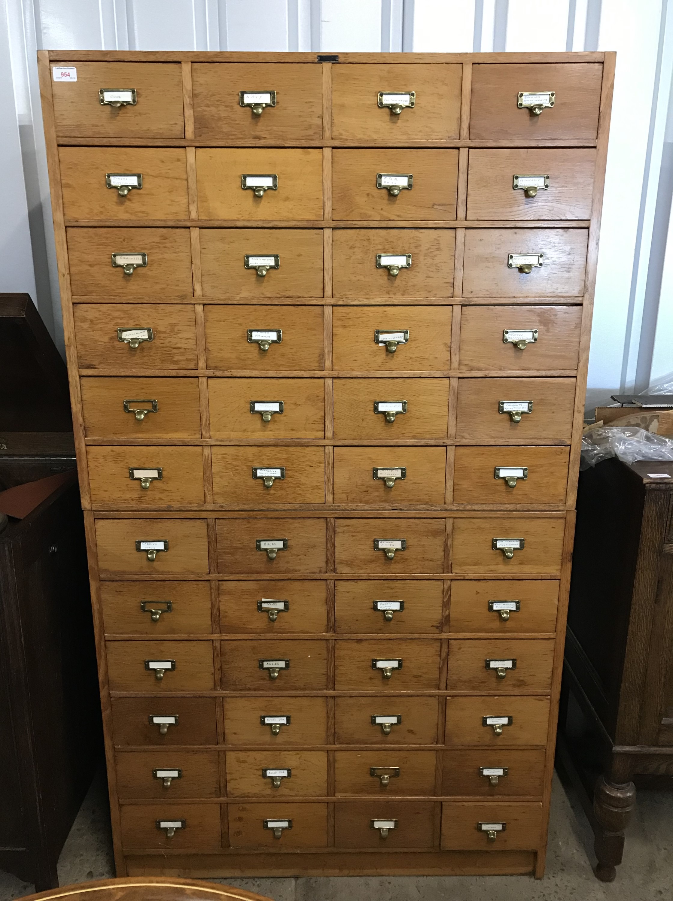 A mid 20th century oak sectional filing cabinet, 95 x 45 x 169 cm