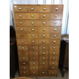 A mid 20th century oak sectional filing cabinet, 95 x 45 x 169 cm