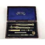 A late 19th / early 20th Century cased set of 'German silver' drawing instruments