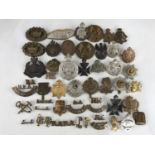 A quantity of Great-War and Second World War British military cap and other badges