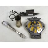 Sundry collectors' items including Georgian candle snuffers, an AA car bumper badge, a silver fork