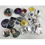 A quantity of rock and pop related button and lapel badges etc