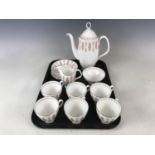 A Royal Albert Safari pattern coffee service for six, comprising coffee pot, milk jug, sugar bowl