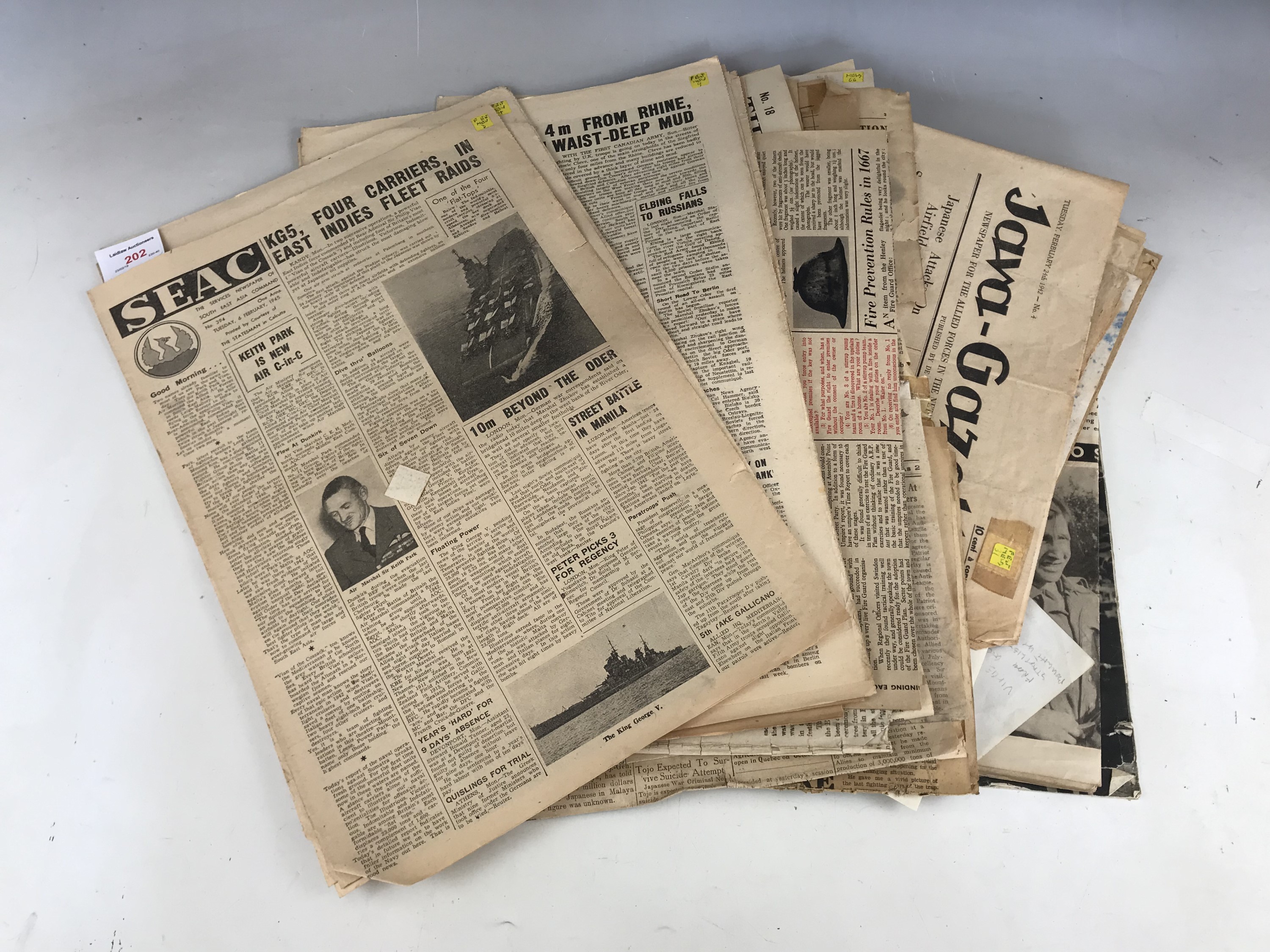 A quantity of wartime newspapers