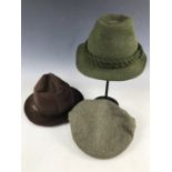 A P. J. Powell chocolate-brown cord hat, size L, together with a green wool hat and a Mascot tweed