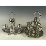 Two late 19th / early 20th century electroplate egg cruet sets