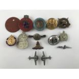 A small quantity of military insignia including an Old Contemptables Association lapel badge etc