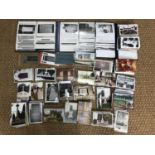 A large quantity of postcards and photographs of War memorials etc