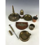 A quantity of trench art and military metalware including a Pusser's rum measure