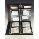 Three philatelic ring binders containing a collection of 1980s First Day Covers, including the