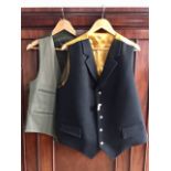 A gentleman's Alexander James black wool and gold silk sporting waistcoat, approximately 48", in 'as