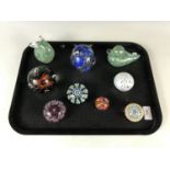 Nine paperweights including a rabbit, a duck and a Caithness Moonflower paperweight etc