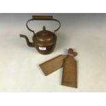A small copper / brass kettle and a pair of butter pats