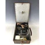A vintage Setright bus conductor's ticket machine with case