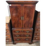 A quality Georgian-style flame-figured mahogany cabinet on chest of diminutive stature, 61 x 42 x