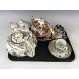 A late 18th century Worcester Flight & Barr trio together with two teapots, a sucrier and a trio