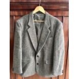 A gentleman's Harris Tweed grey wool herringbone tweed jacket / blazer, in unworn and 'as new'