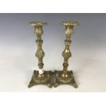 A pair of brass candlesticks, 22 cm