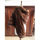 A mid 20th century lady's mink stole together with one other faux mink collar